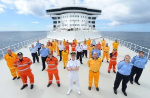 SES volunteers take prime position aboard QM2.Image: Carnival Australia