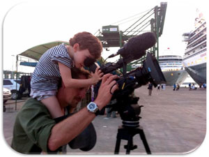 Simon's daughter Uma helps film the Queen Elizabeth